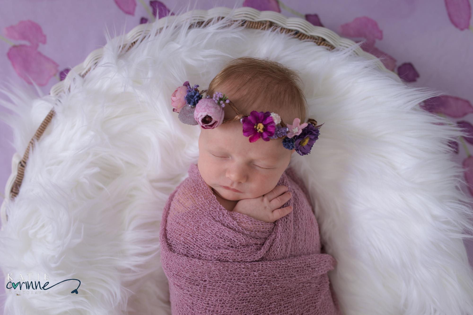 Baby girl sleeping during destination newborn photo session