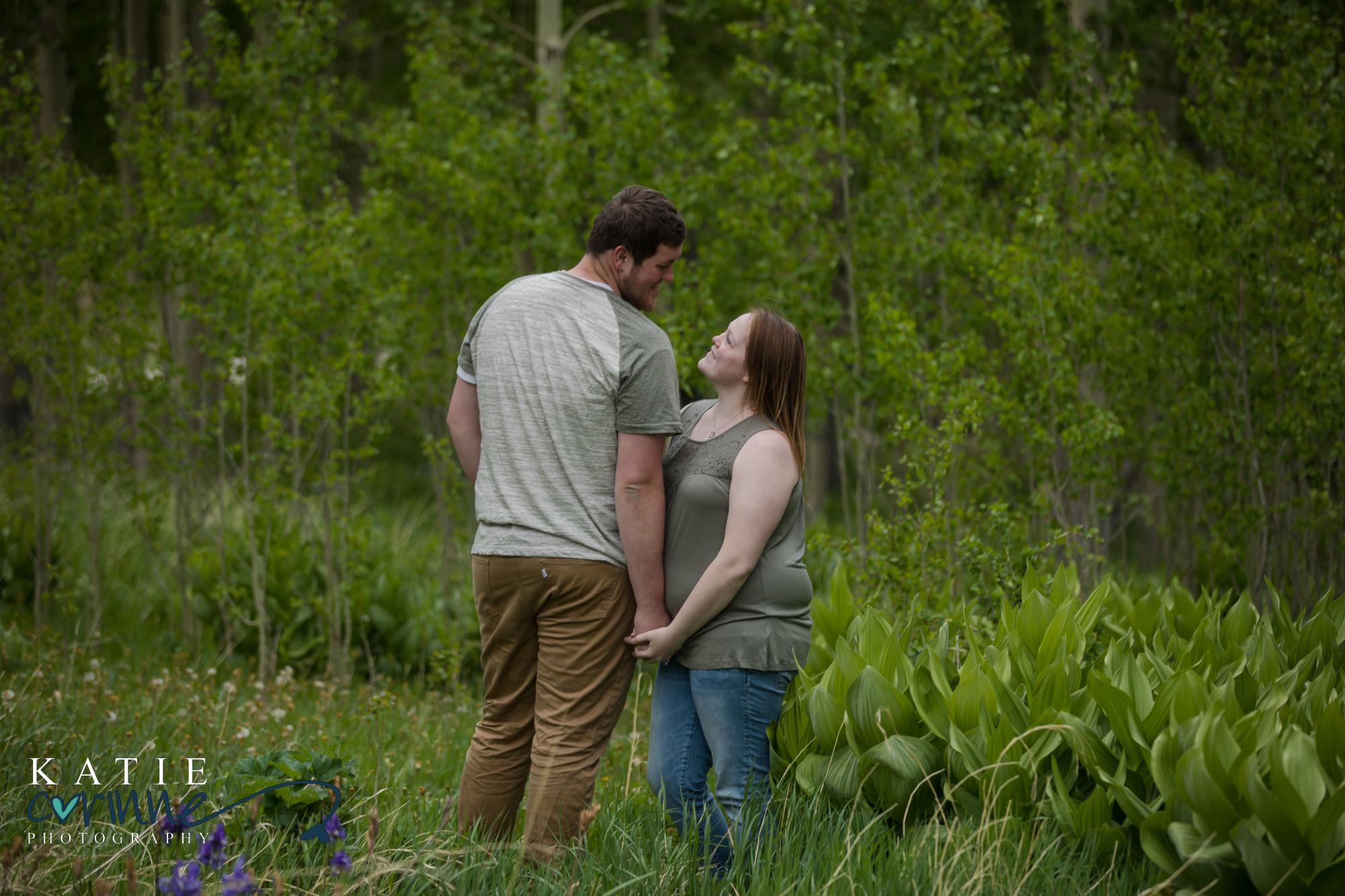 couple poses for San Isabel National Forest engagement photography session