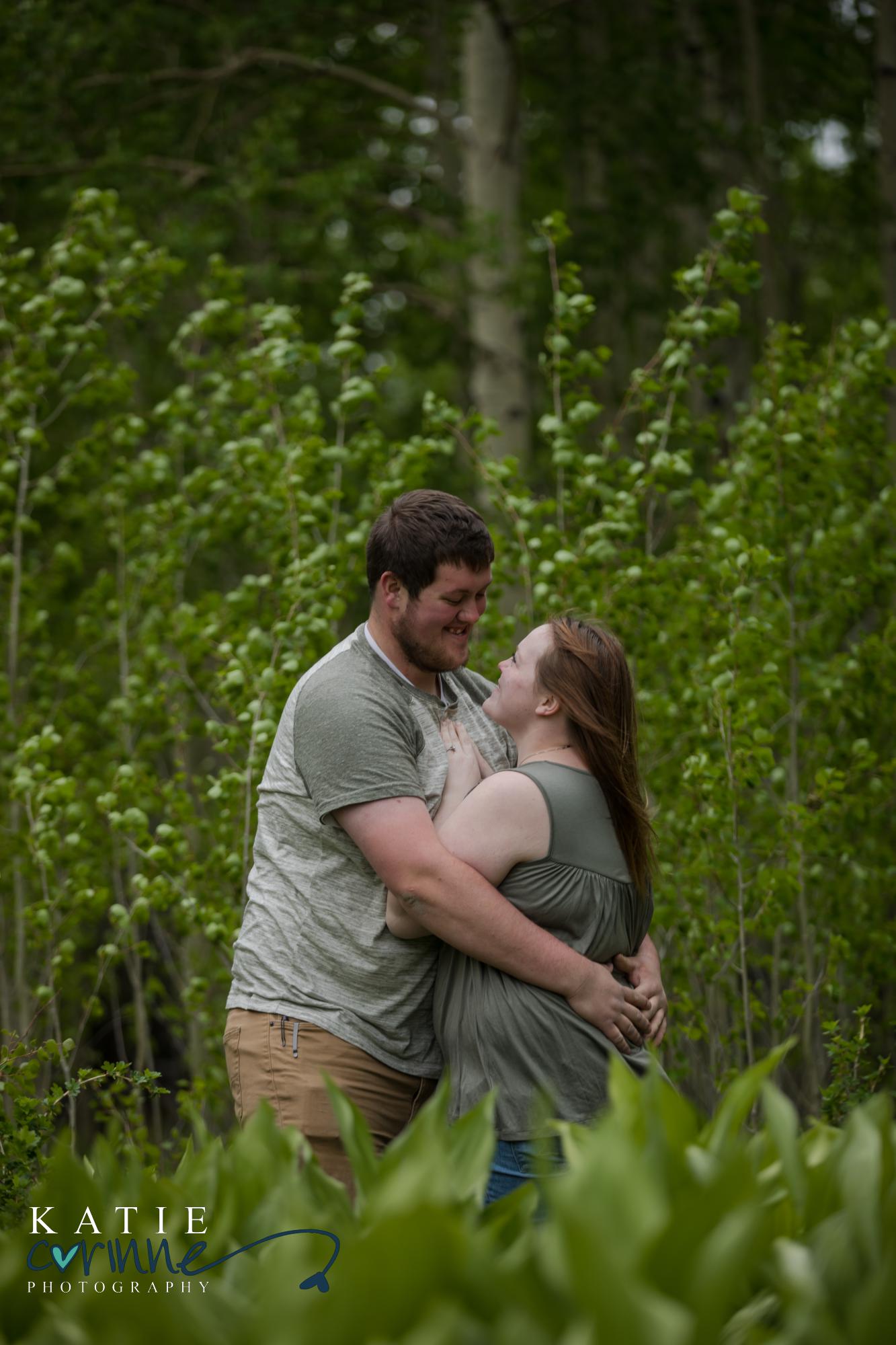 couple poses during San Isabel National Forest engagement session