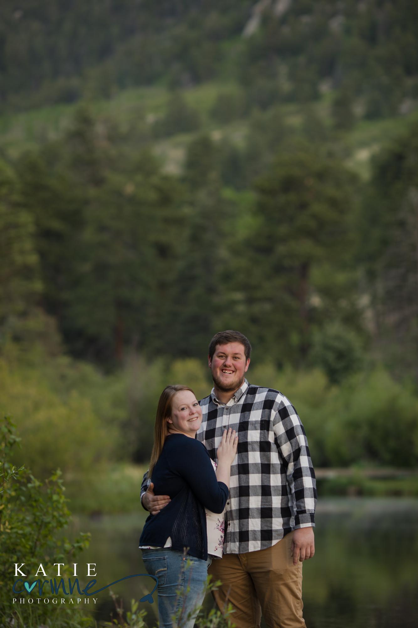 engaged couple pose for Colorado Springs wedding photographer
