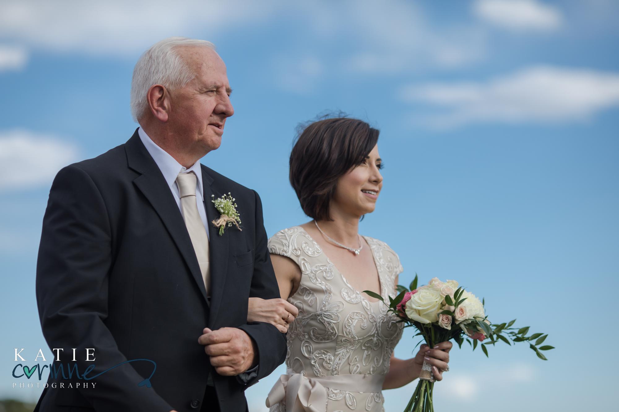 father walks bride down aisle at colorado elopement