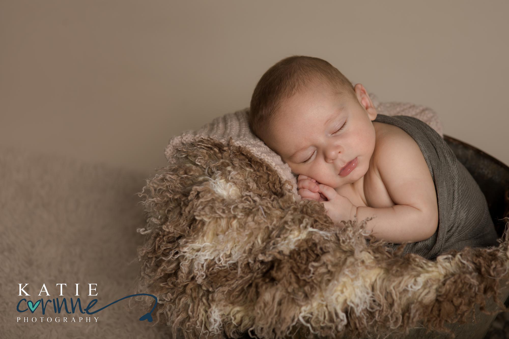 Snugly newborn photo by Katie Corinne
