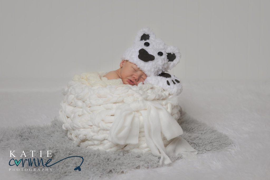 Newborn baby dressed as Polar Bear