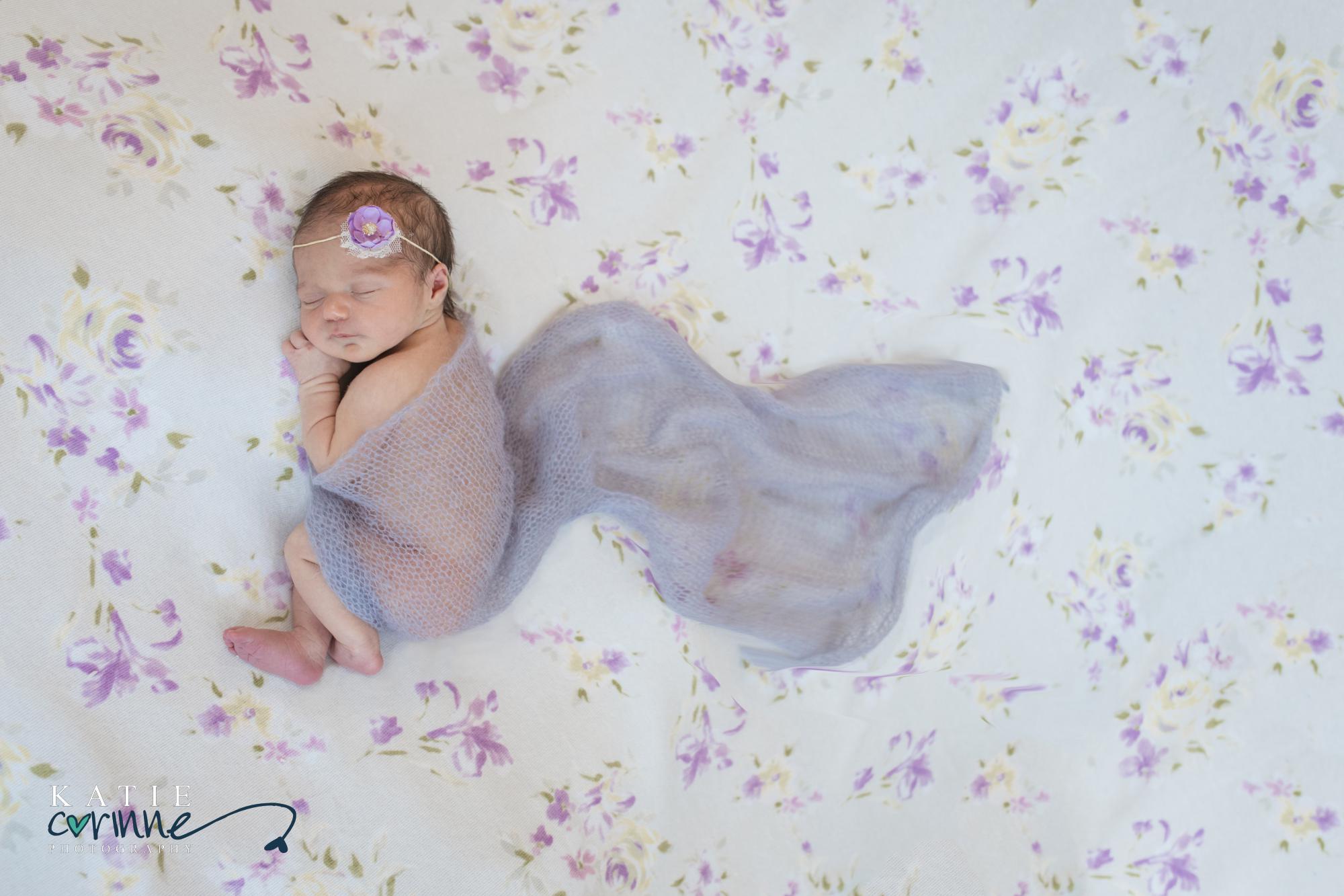 Newborn girl purple wrap