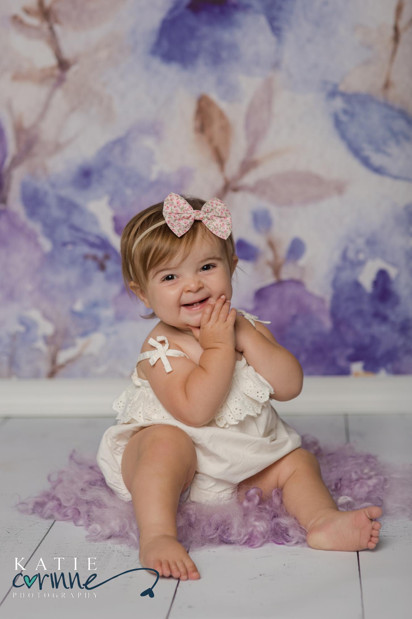 Brynlee being super cute for her one year cake smash session