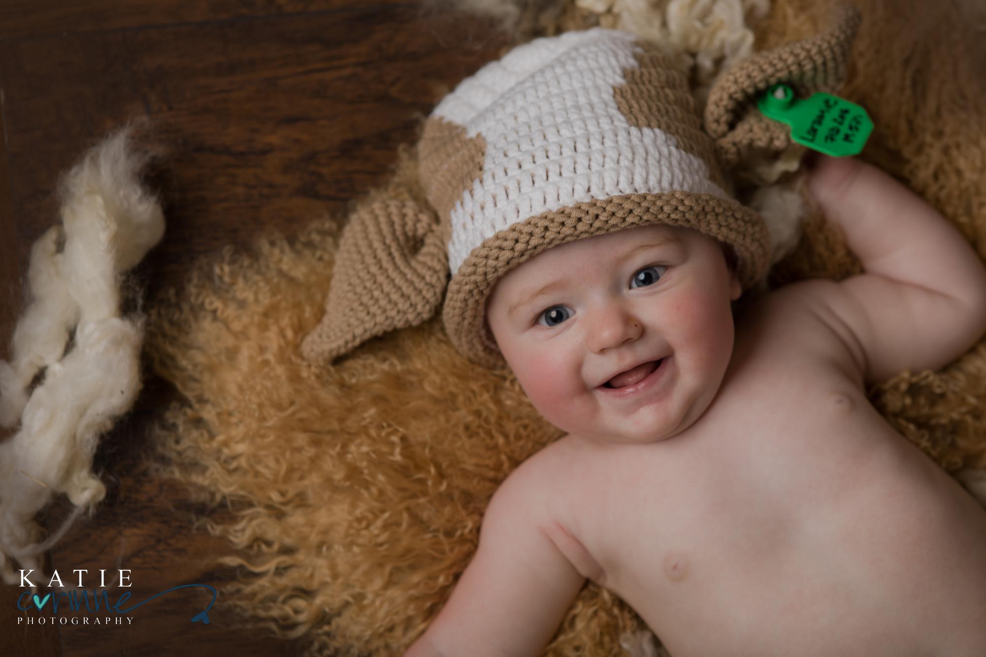 baby with a cow hat