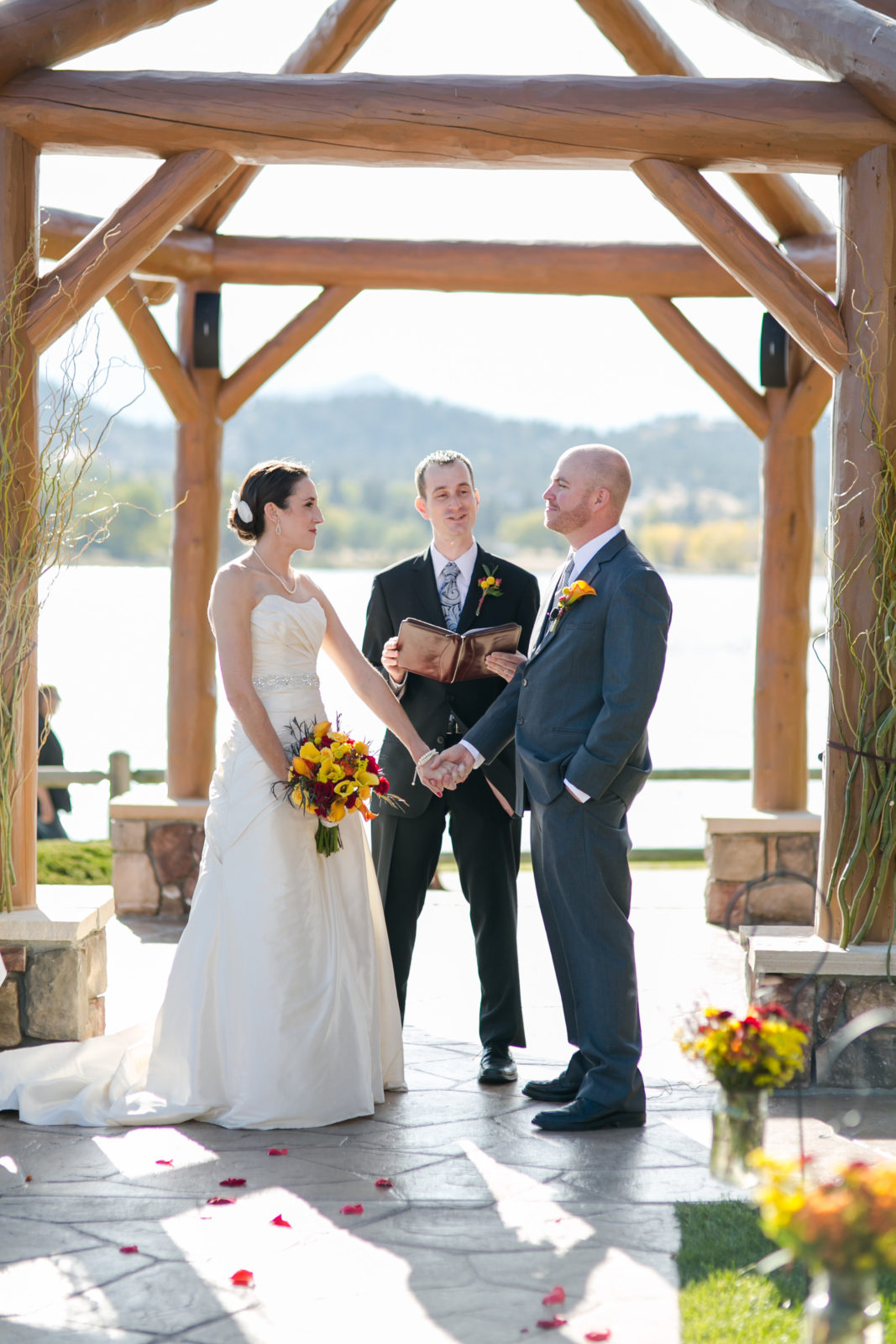Fall wedding ceremony by estes park lake