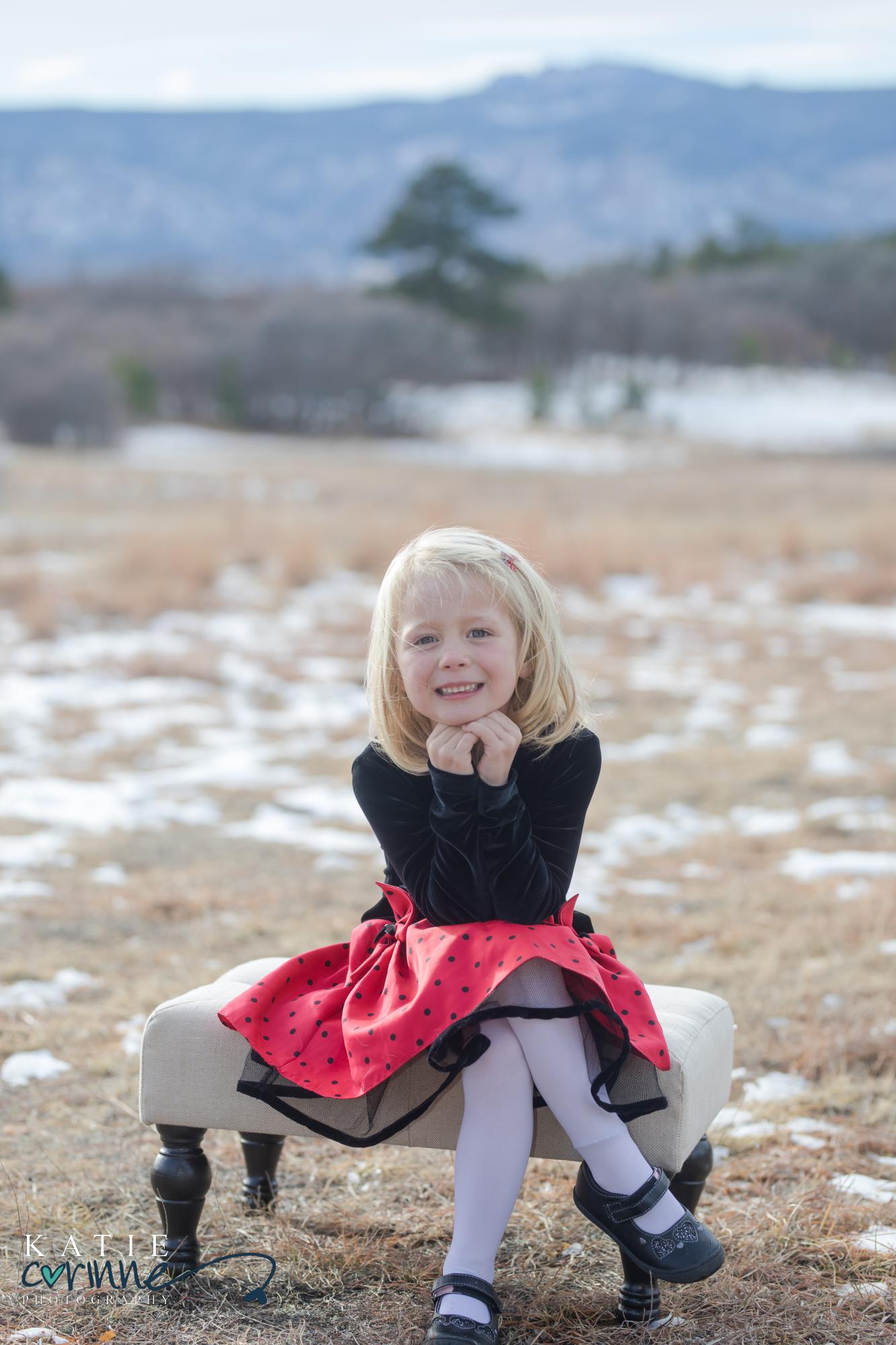 Young girl poses and smiles in Dawson Butte