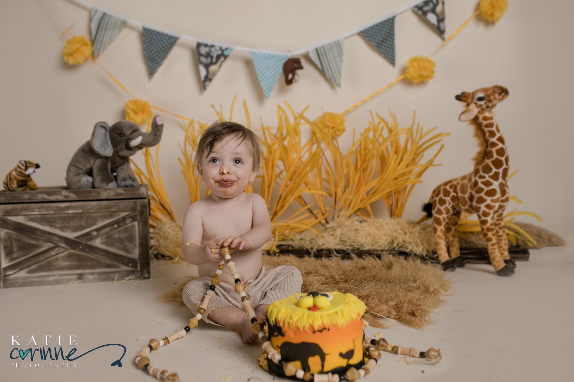 one year old smashes and eats birthday cake