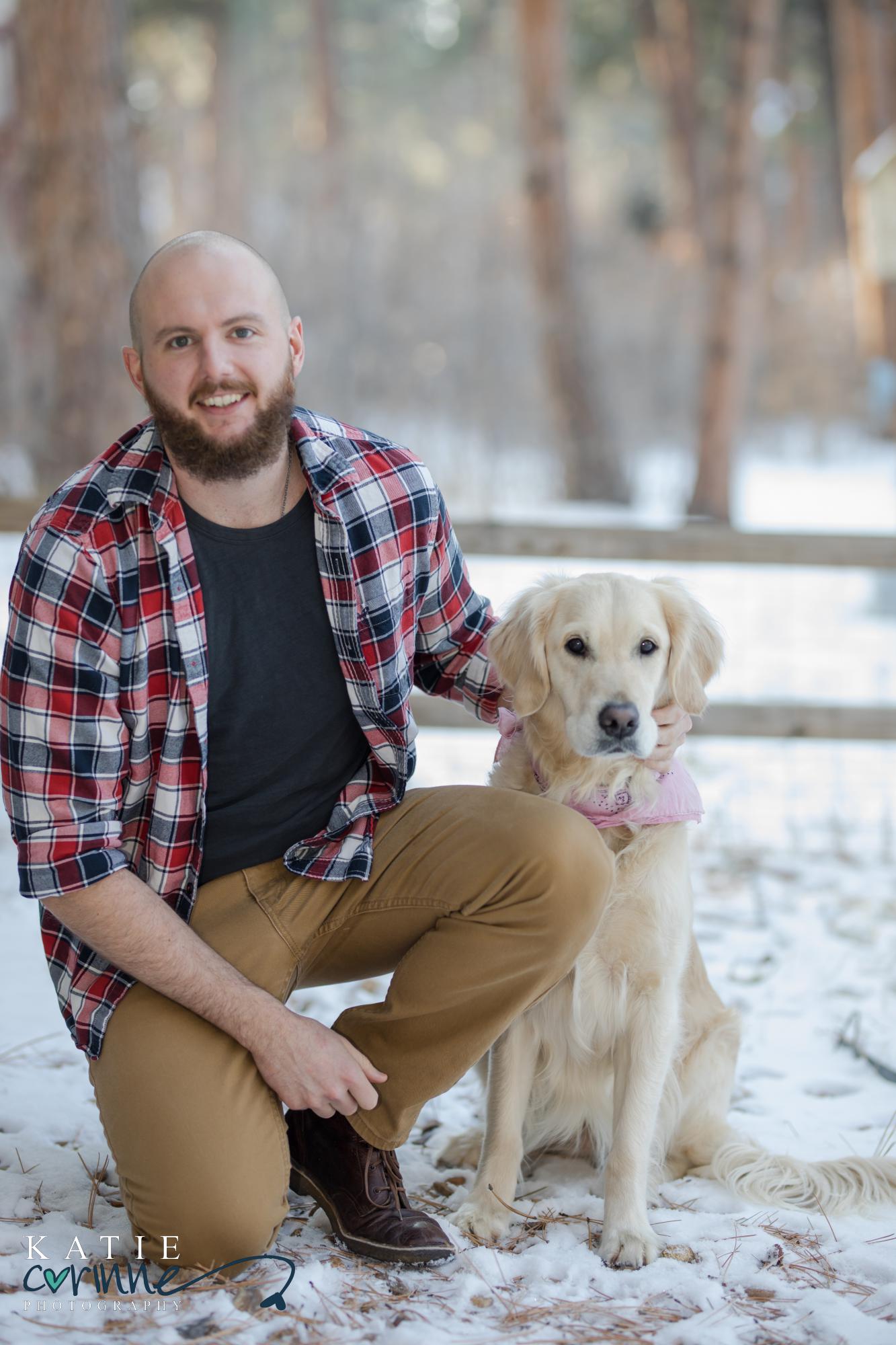 Colorado man poses with dog in Colorado