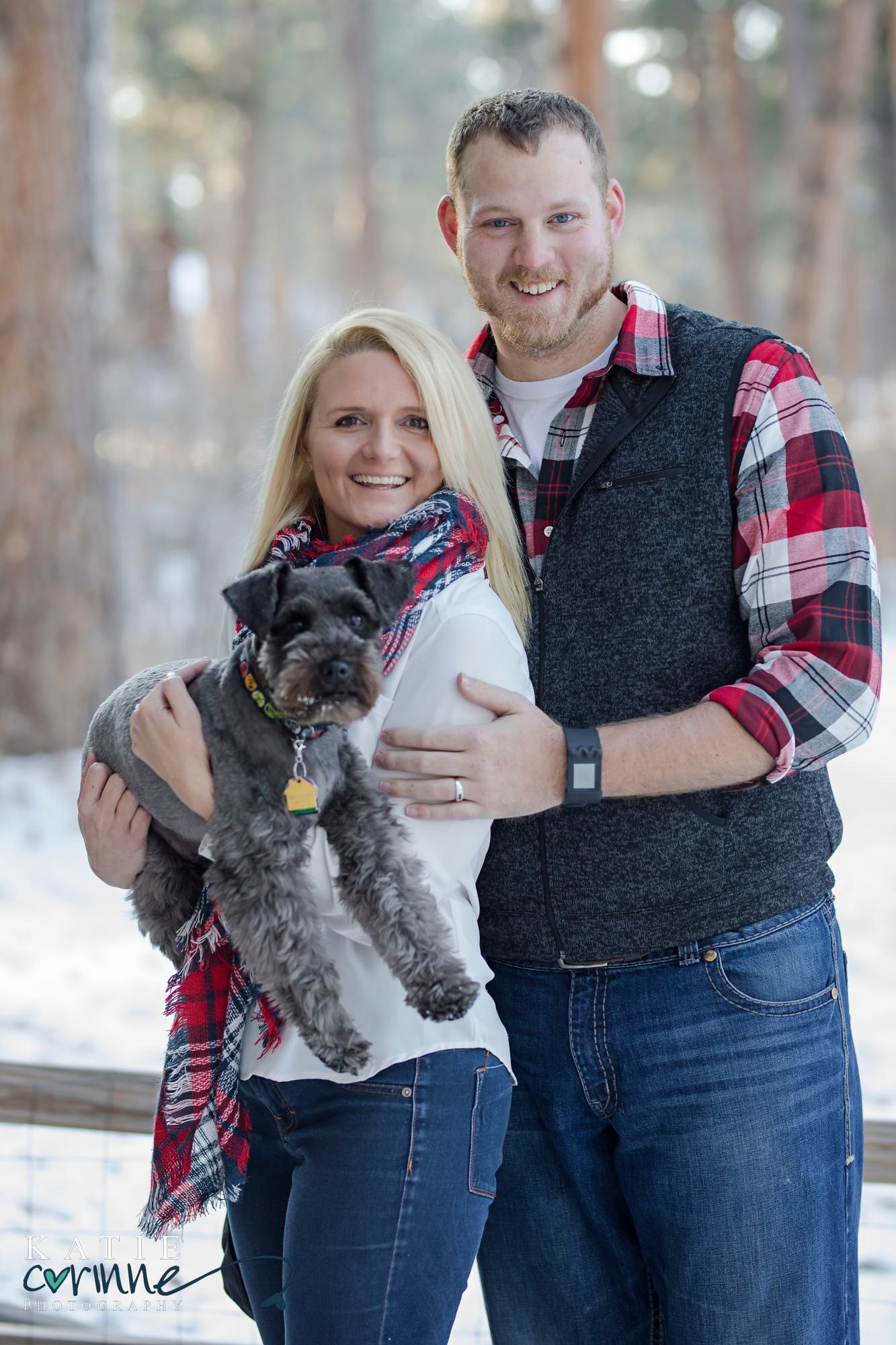 Colorado couple smile with their dog