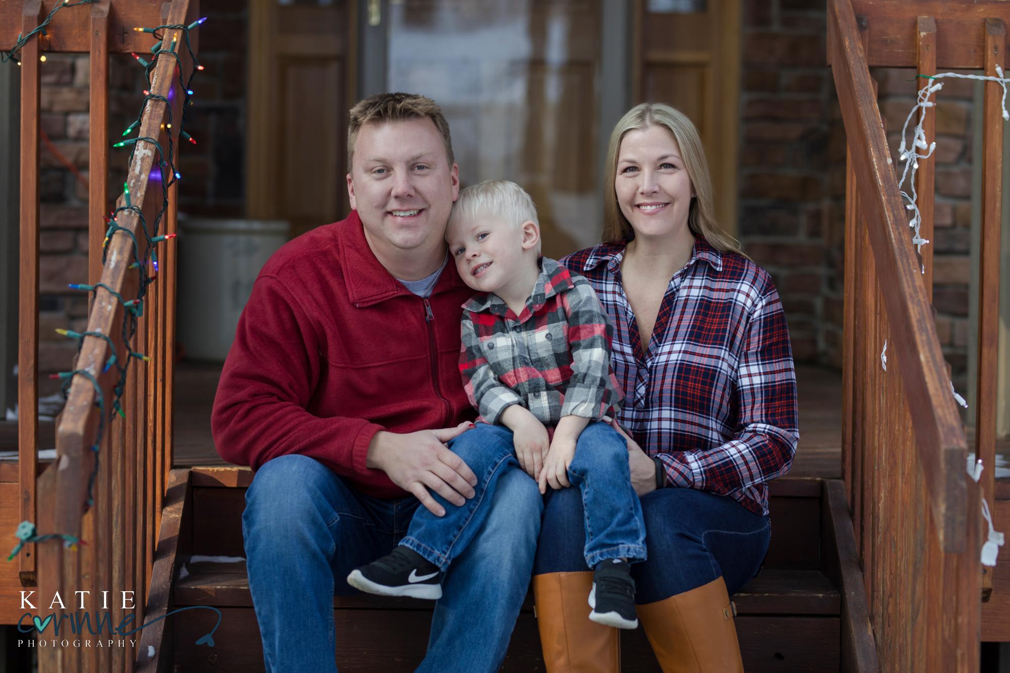 Colorado couple pose with their young son at parents house