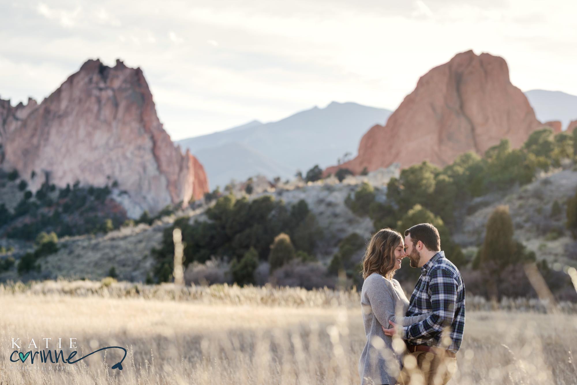 colorado springs couple pose for their engagement photographer