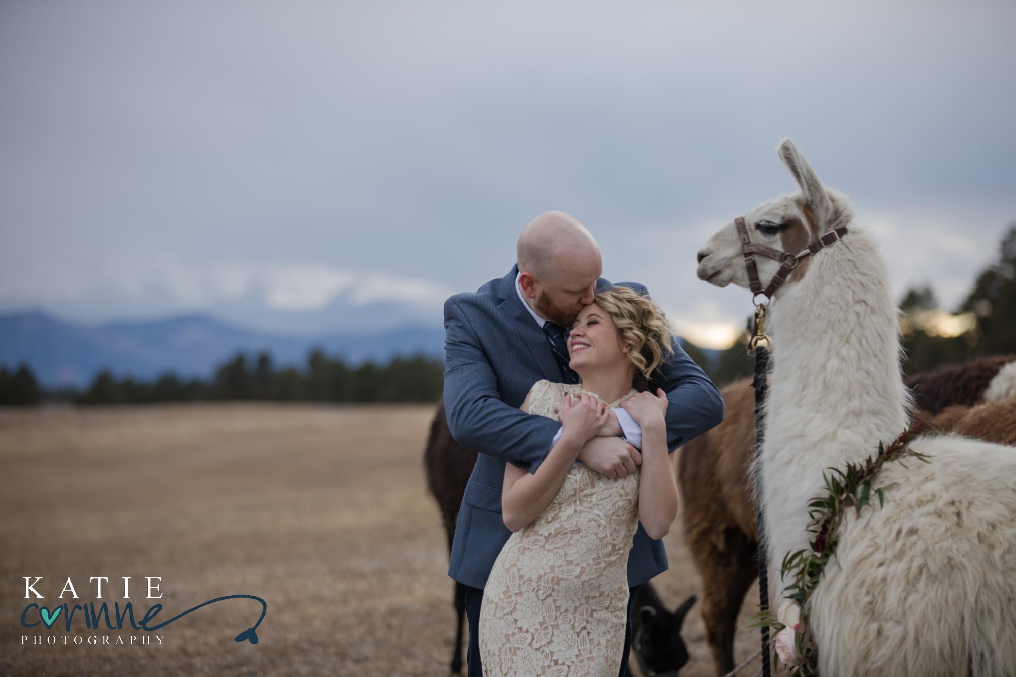 bride and groom hold each other and kiss at Younger Ranch