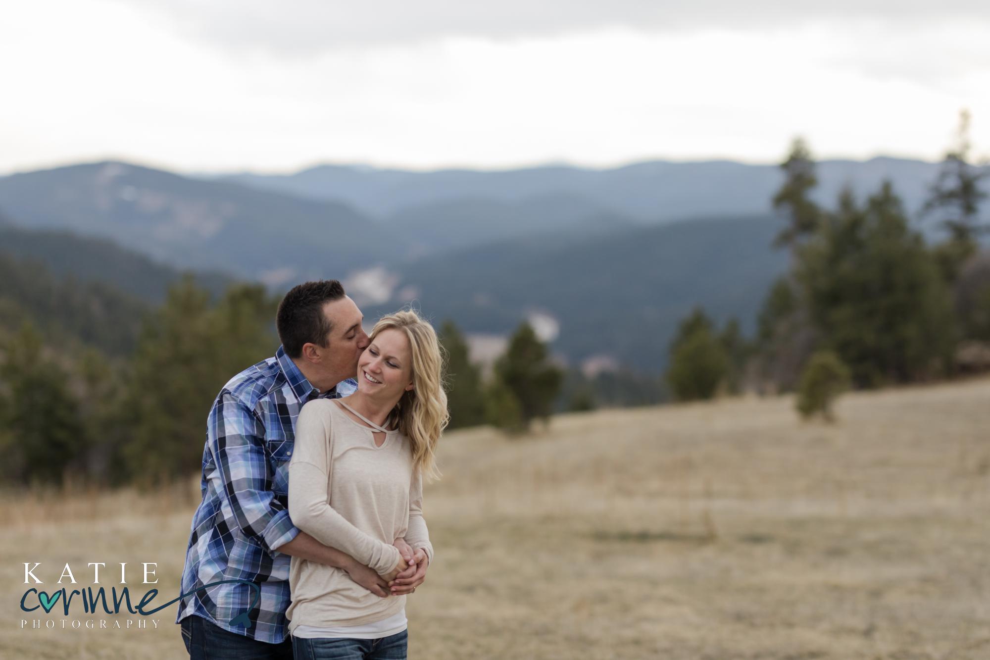 man holds fiance in Morrison Colorado