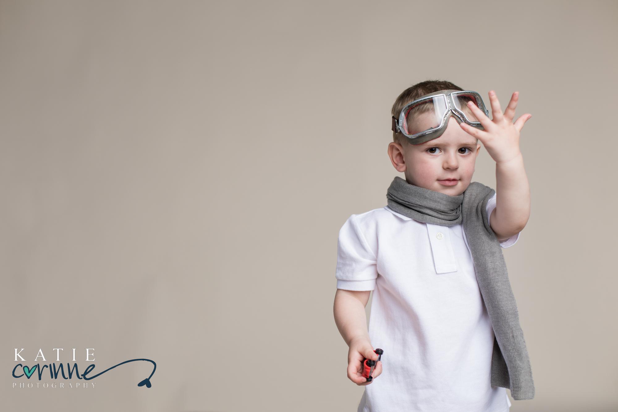 Little boy poses for Colorado Springs newborn photographer