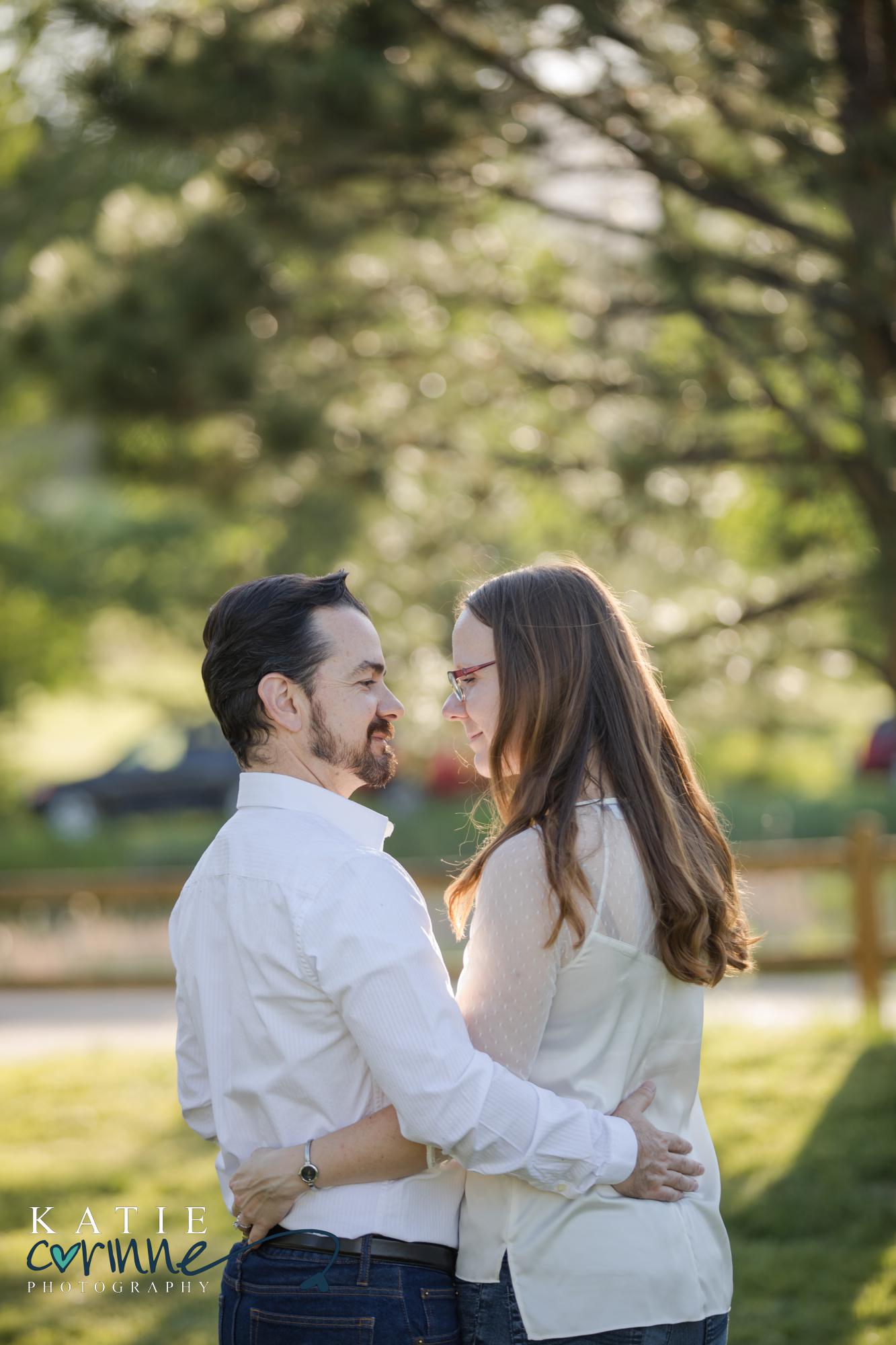Colorado couple look at each other during engagement session