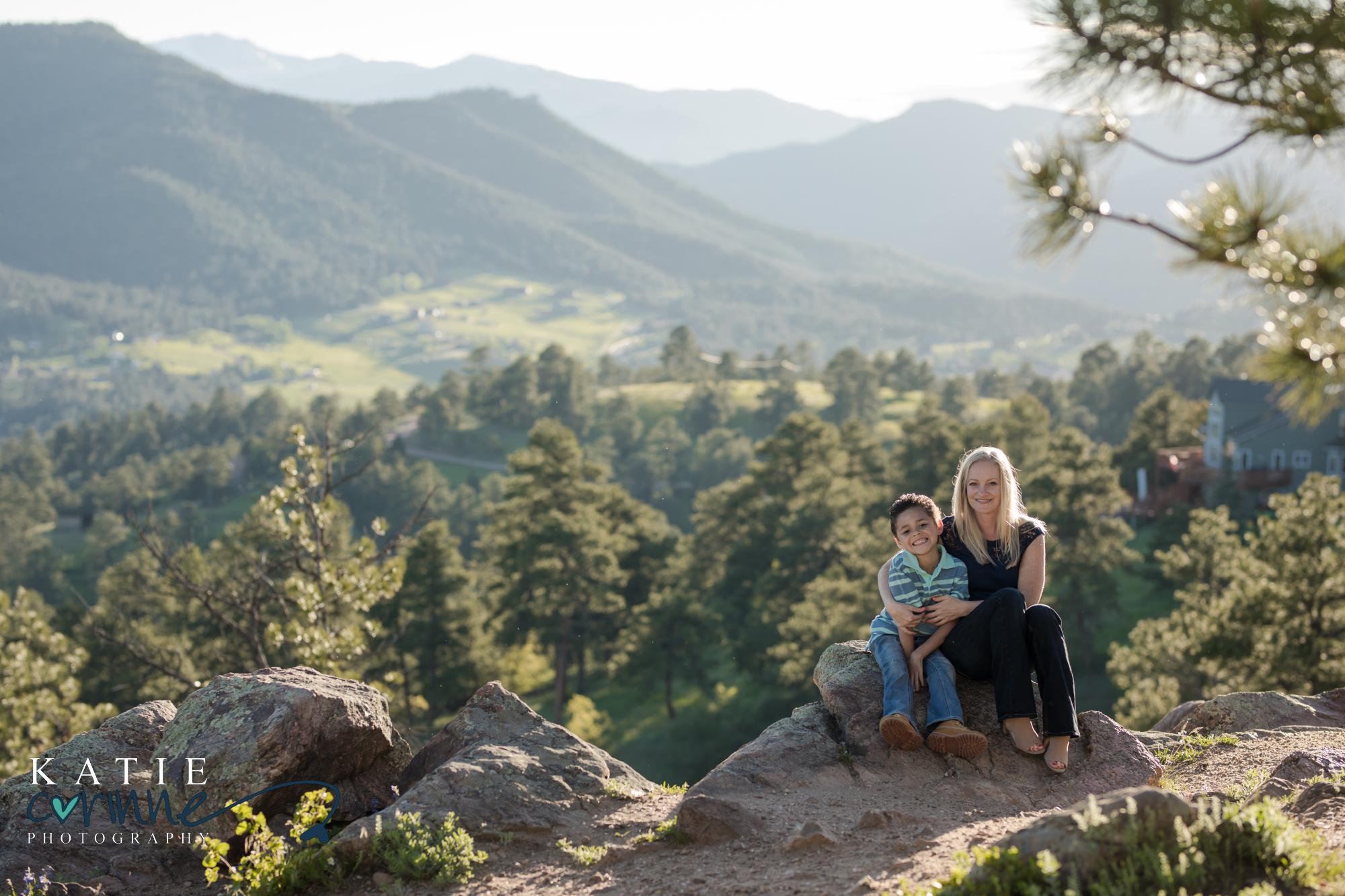 Family poses for Colorado Springs photography in front of mountains