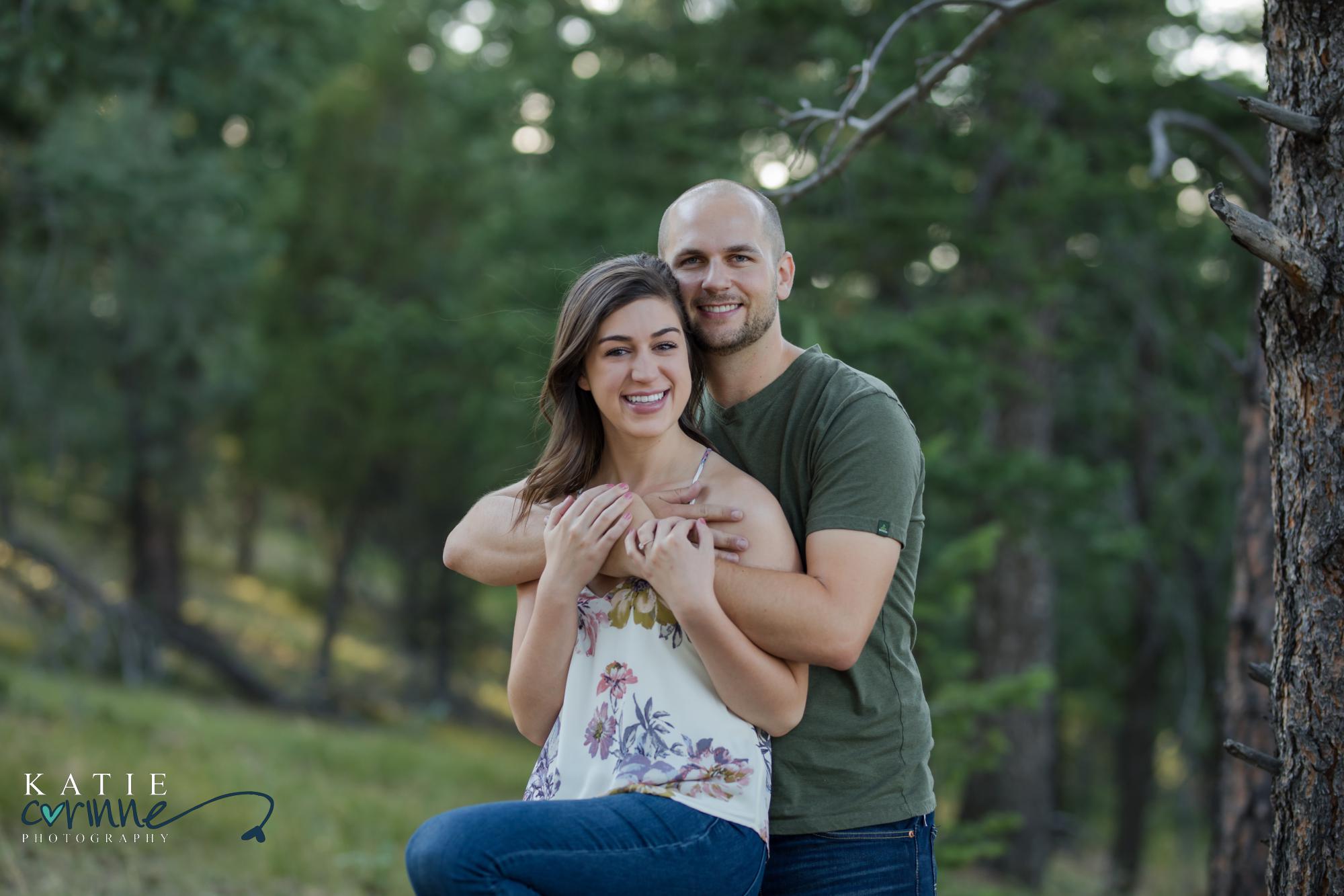 couple poses at Mt. Falcon engagement session