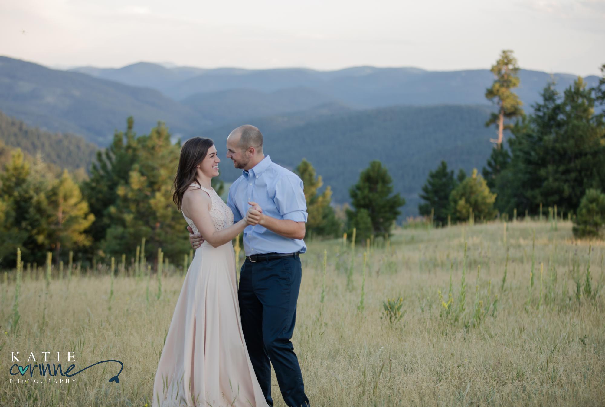 Cute engaged couple at Mount Falcon in Colorado