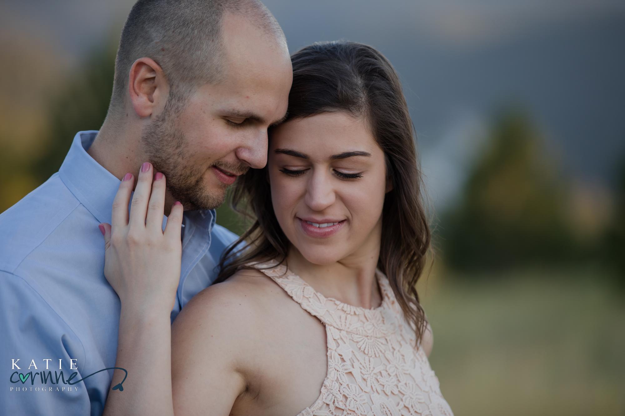 couple gets photographed during engagement session