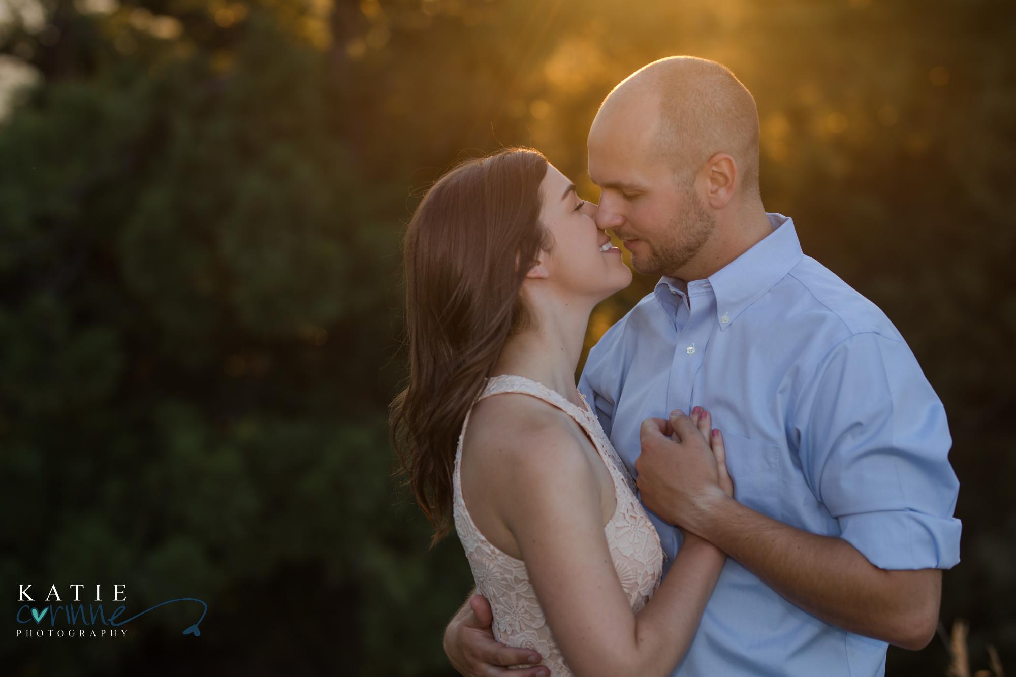 couple gets photographed during Mount Falcon engagement session
