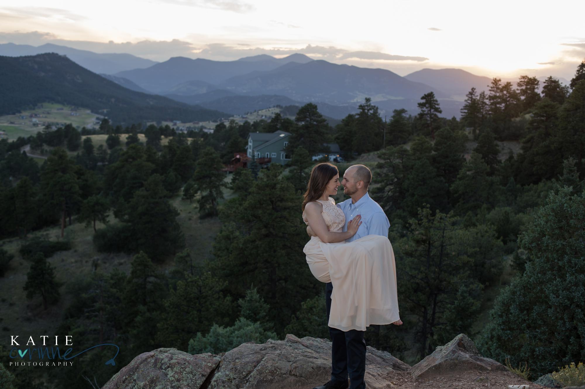 couple gets photographed during mountain engagement session