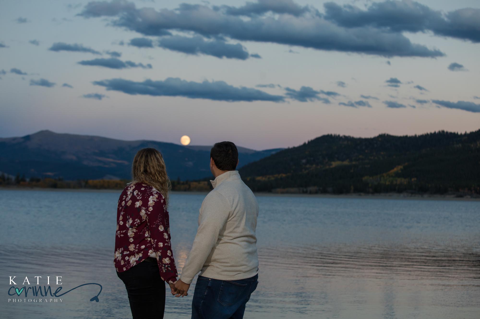 Colorado engaged couple watches moonrise