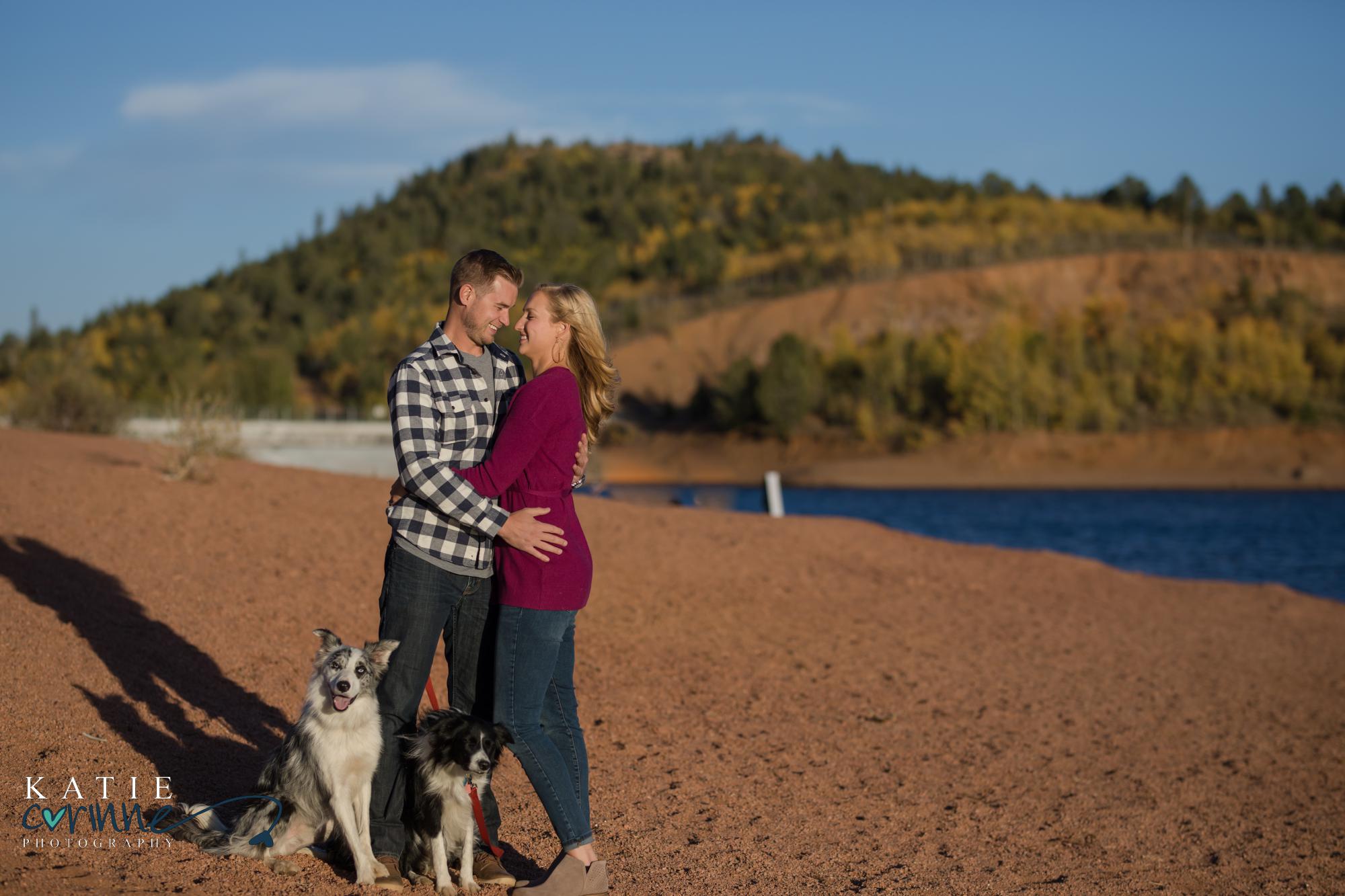 engaged Colorado couple with dogs at Crystal Reservoir