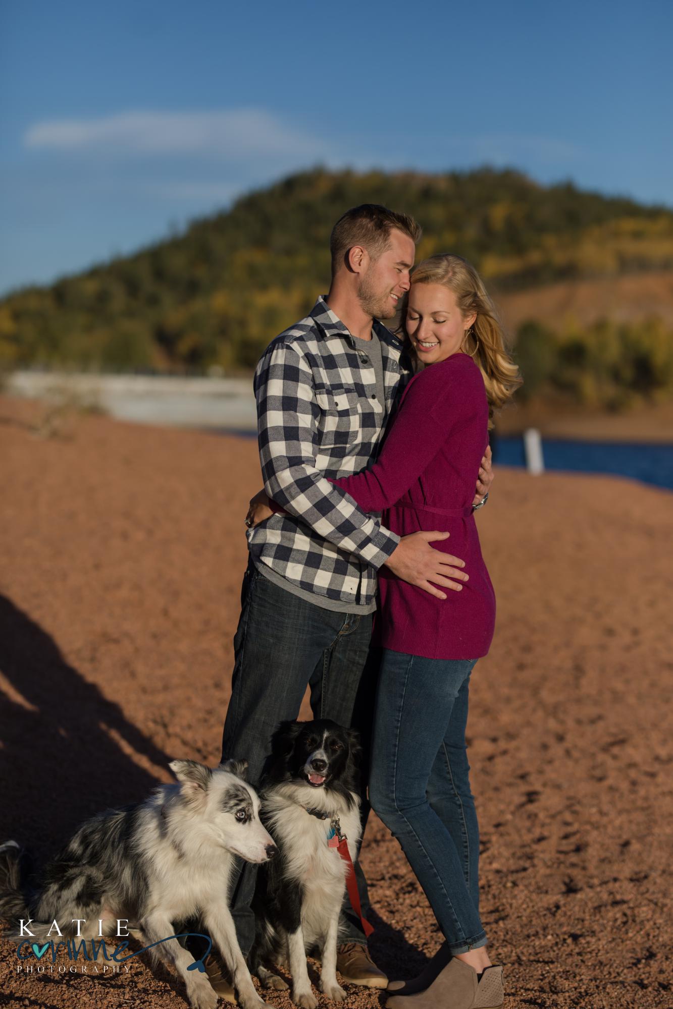 engaged couple with dogs at Crystal Reservoir