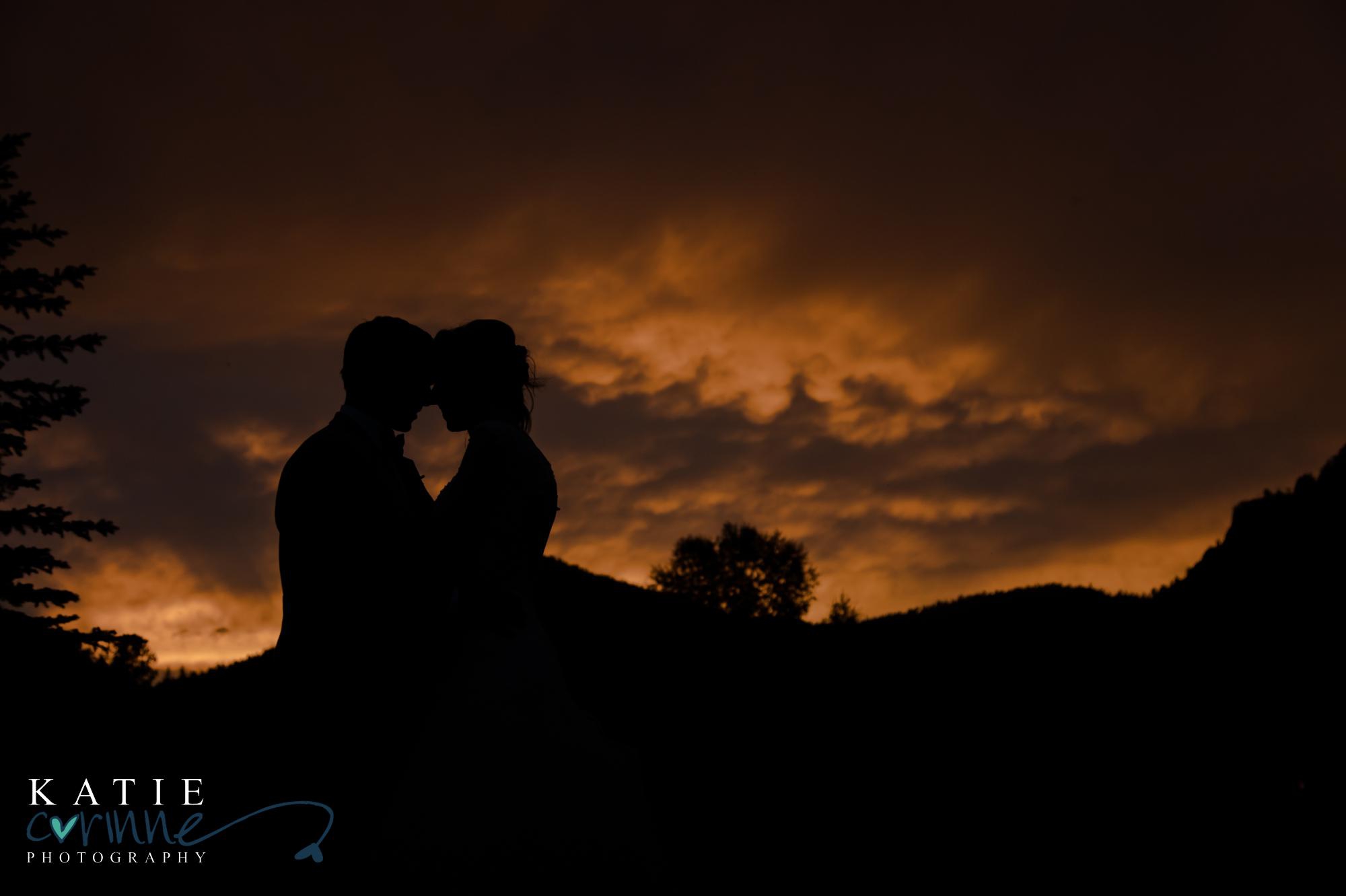 silhouette of bride and groom on wedding day