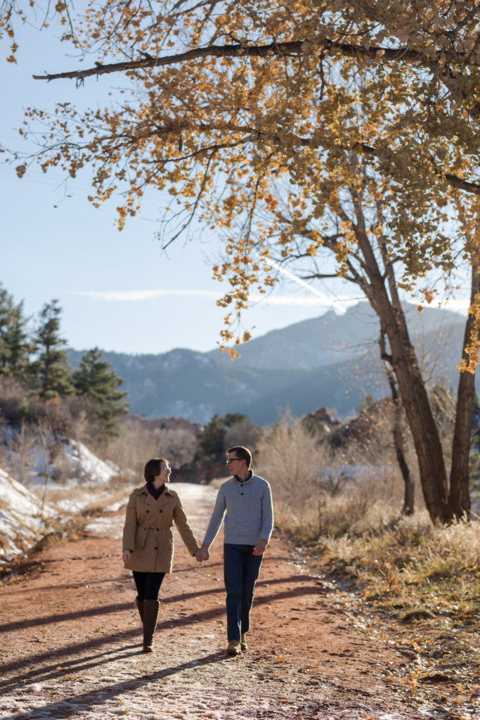 Couple holding hands during Colorado Springs Engagement Session