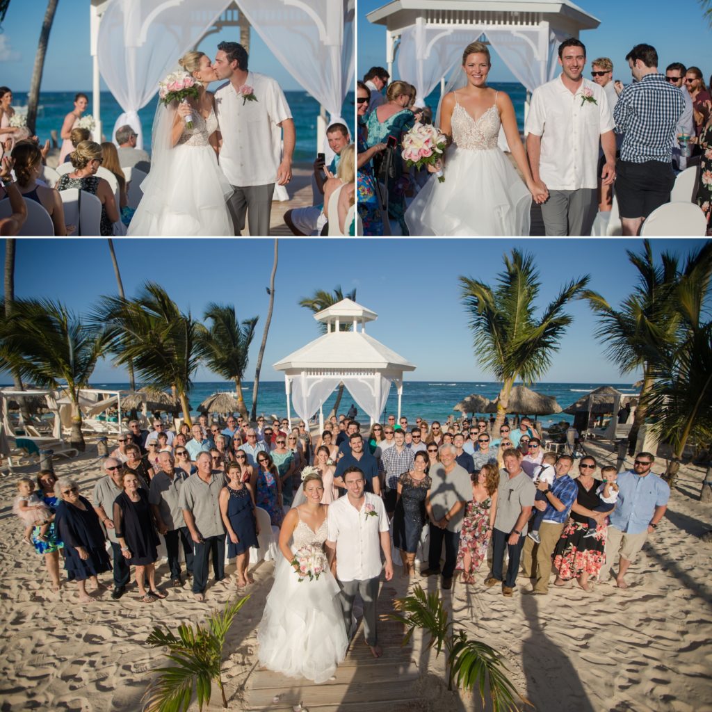 large group photo at beach wedding