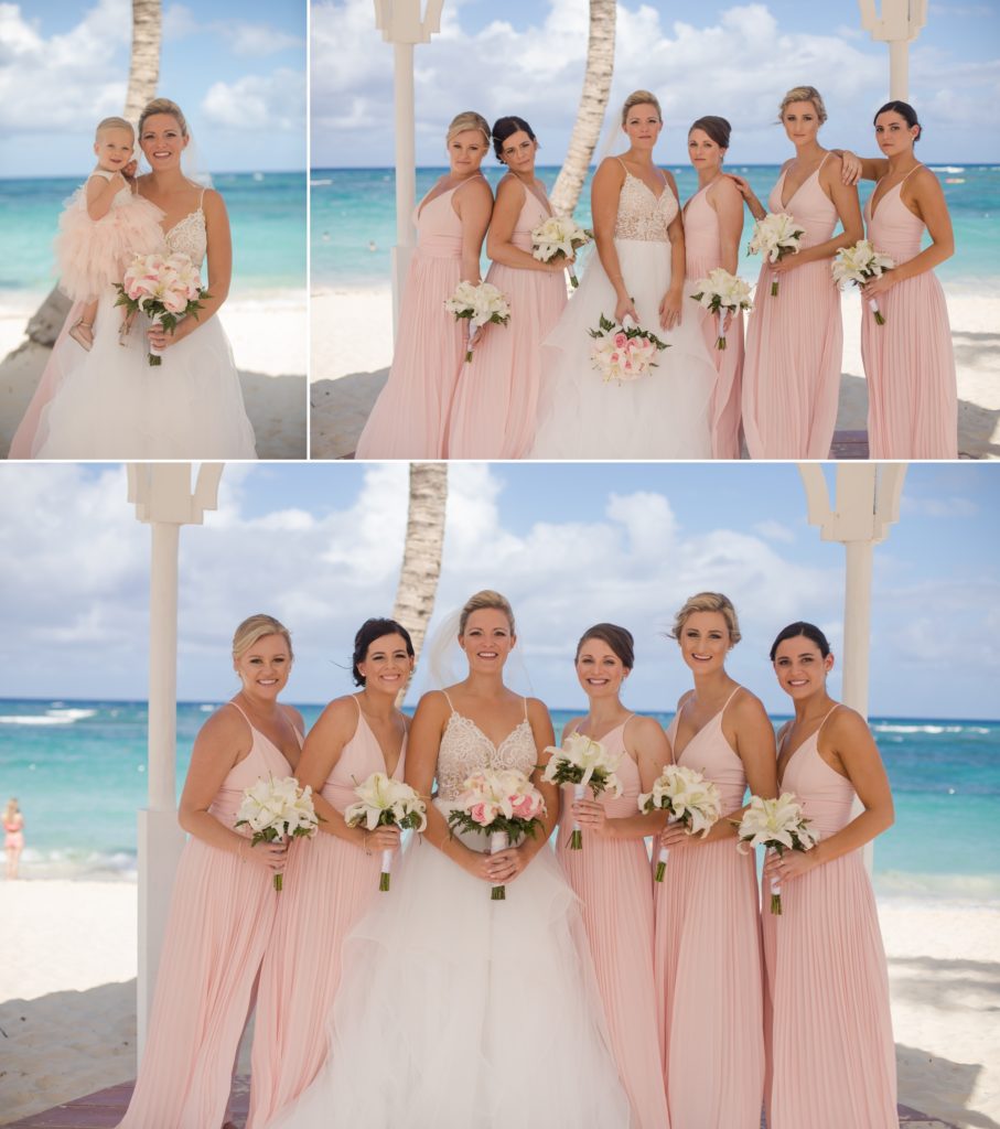 Bride and bridesmaids on sunny beach
