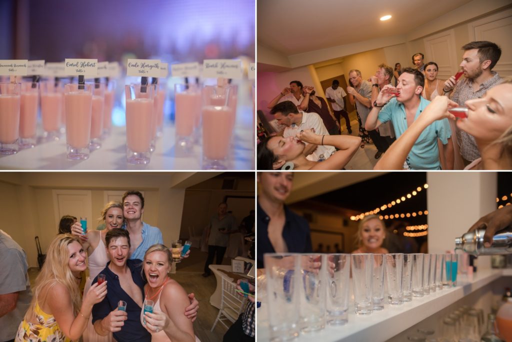 wedding party takes shots at beach resort reception