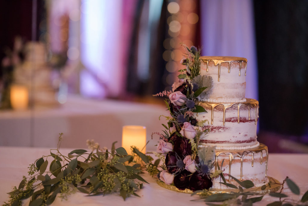 wedding cake on table at wedding reception