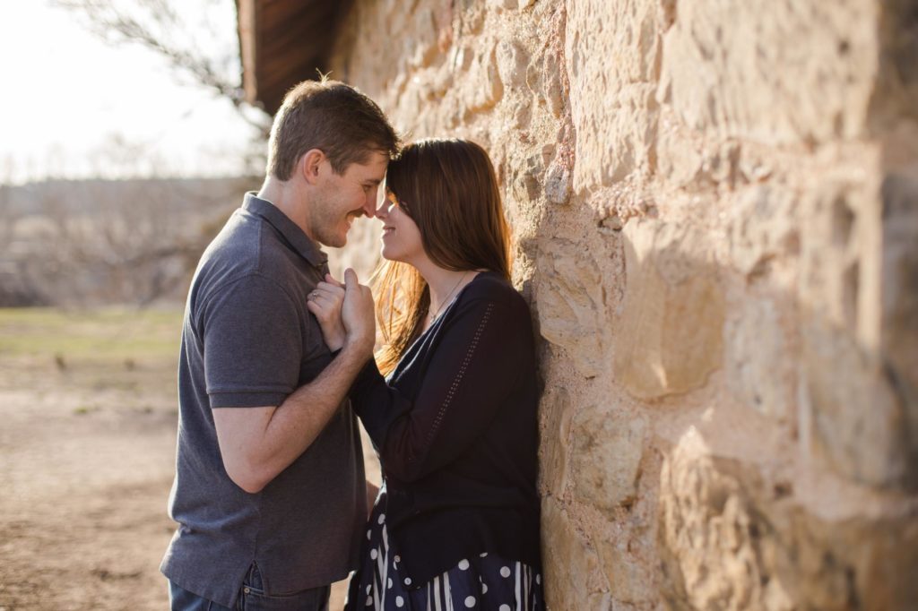Colorado Springs couple at rustic engagement session