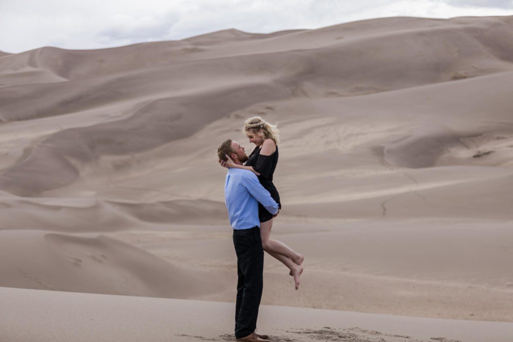 Models at colorado sand dunes for engagement session