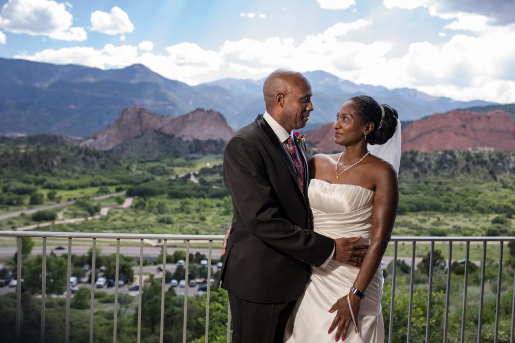 couple gets married on balcony of garden of the gods resort
