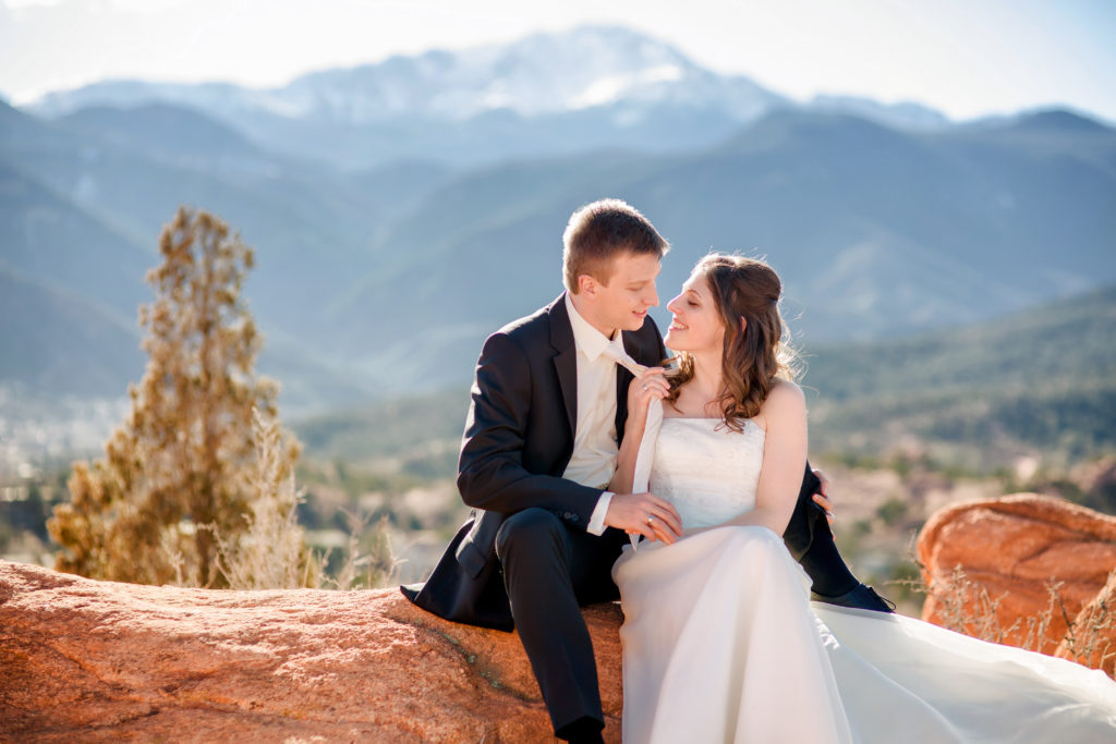 Couple sits at their Colorado Springs elopement