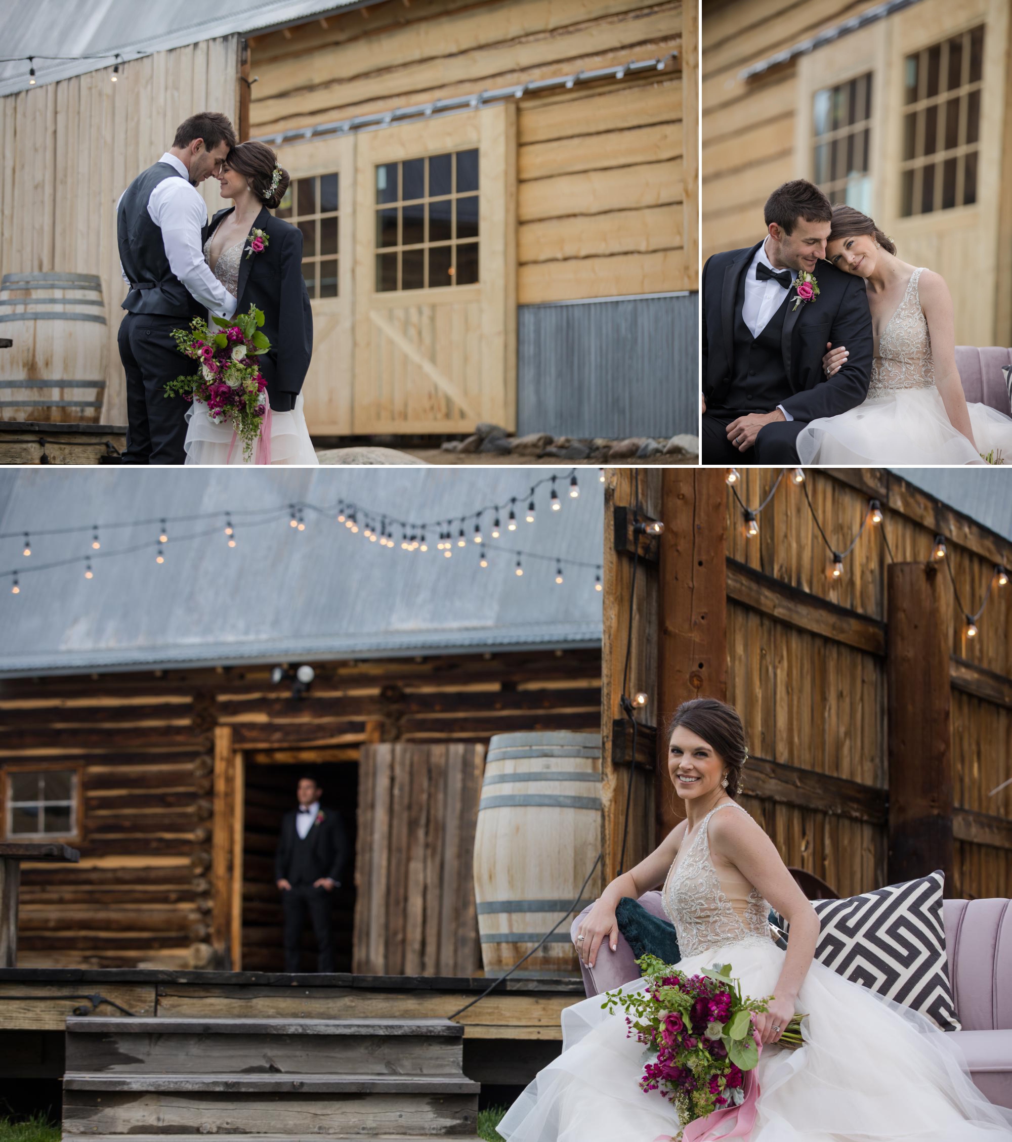 couple poses for wedding photographer at rustic barn venue