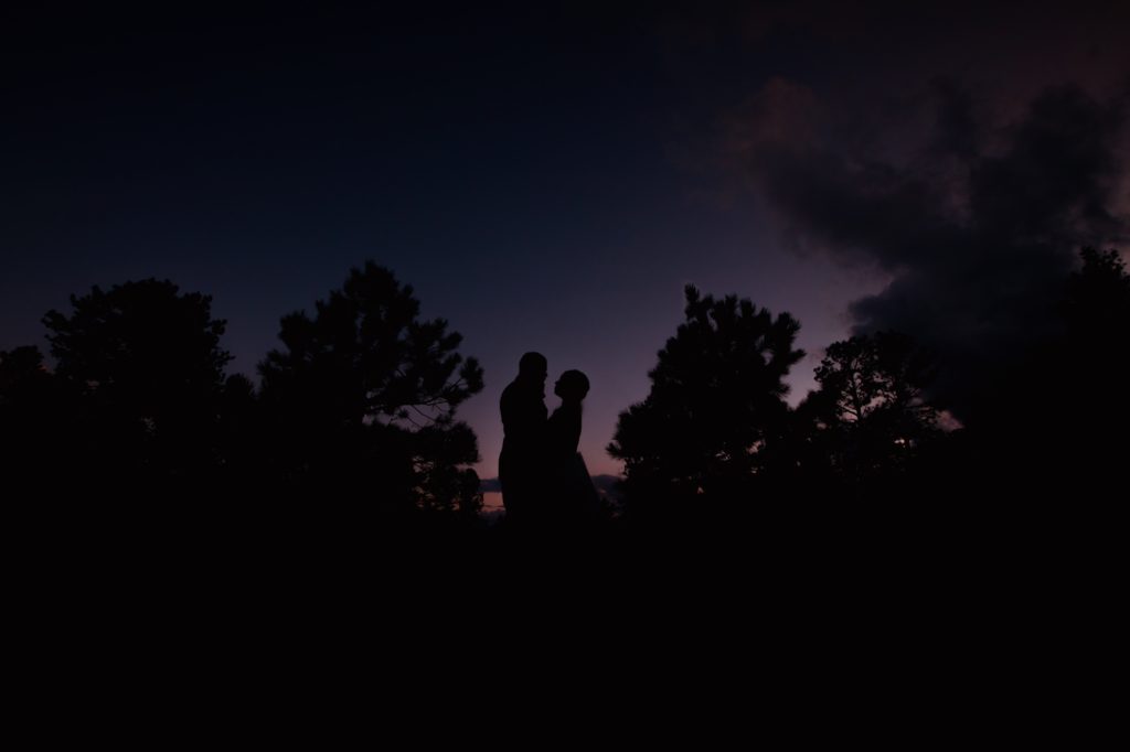 bride and groom in silhouette