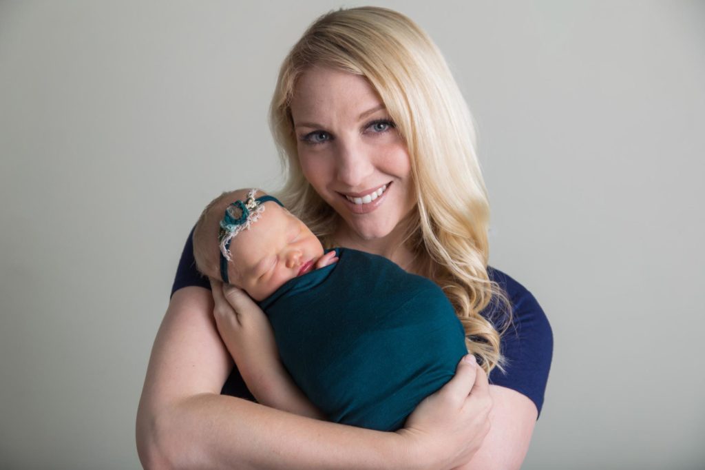 Colorado mom holds baby daughter