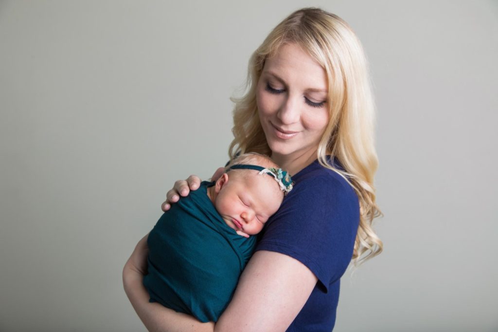 Colorado mom holds newborn daughter