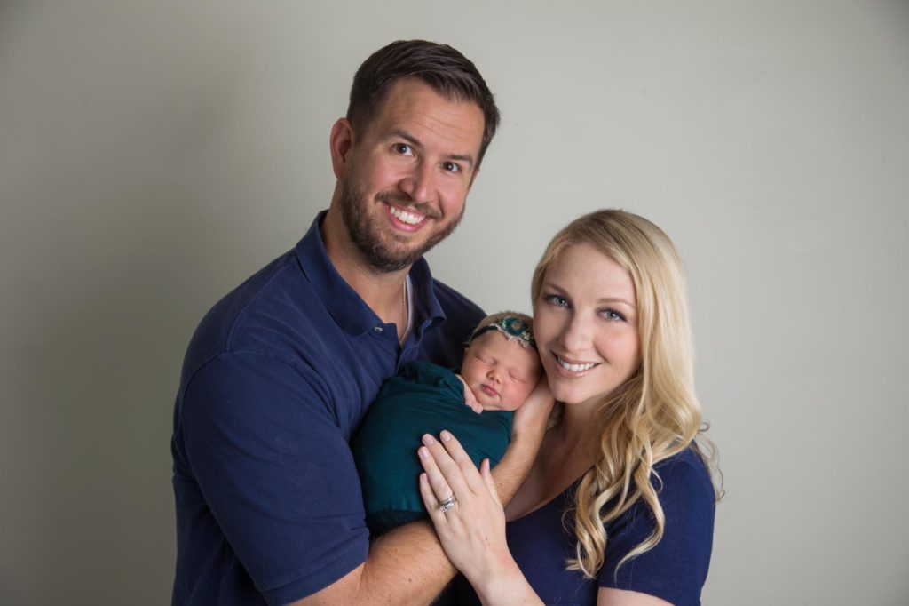 Colorado couple holds baby girl