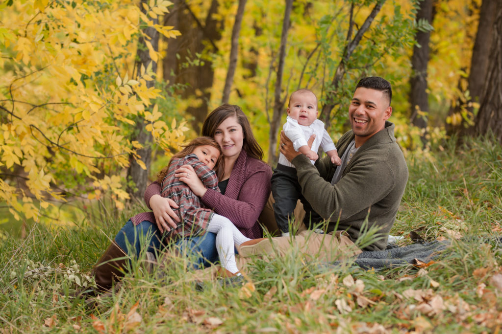 Family with small children in fall