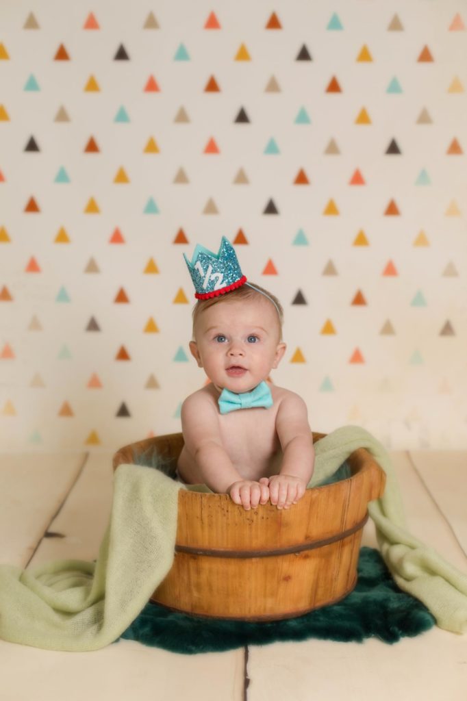 Baby in basket during Colorado milestone photos