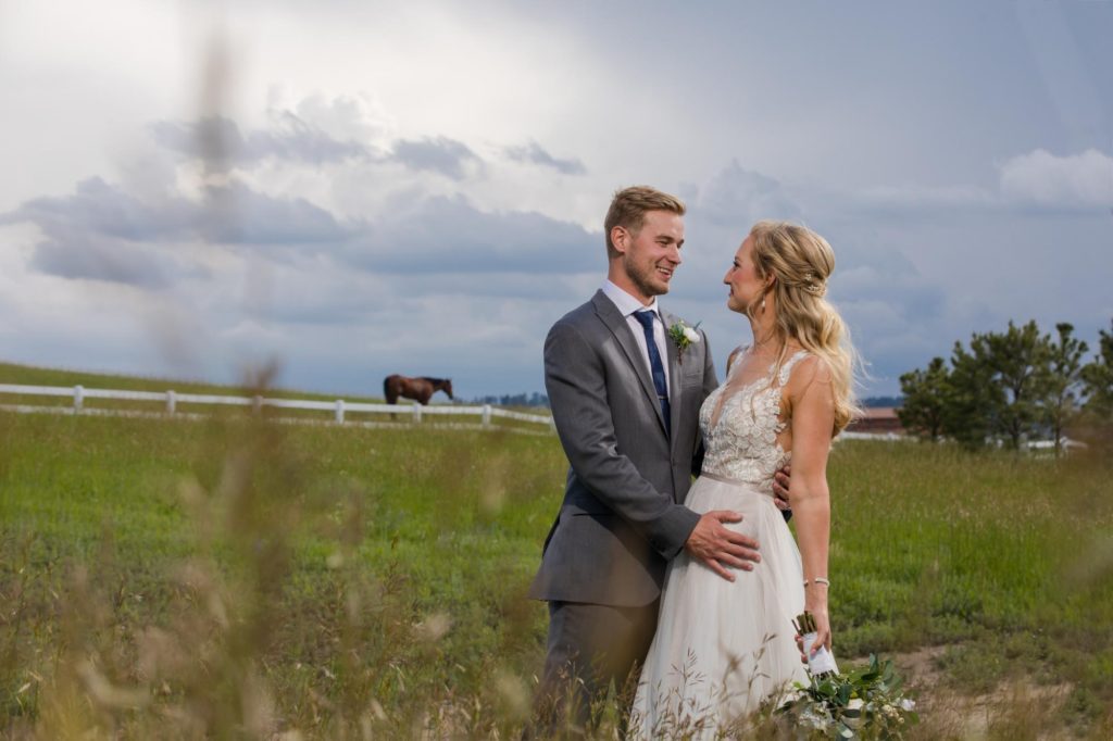 newlyweds at classic ranch wedding