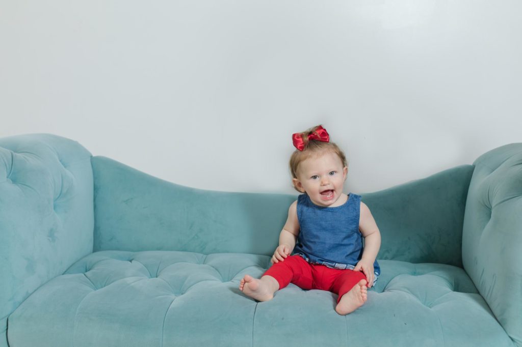 Baby girl in newborn photography studio