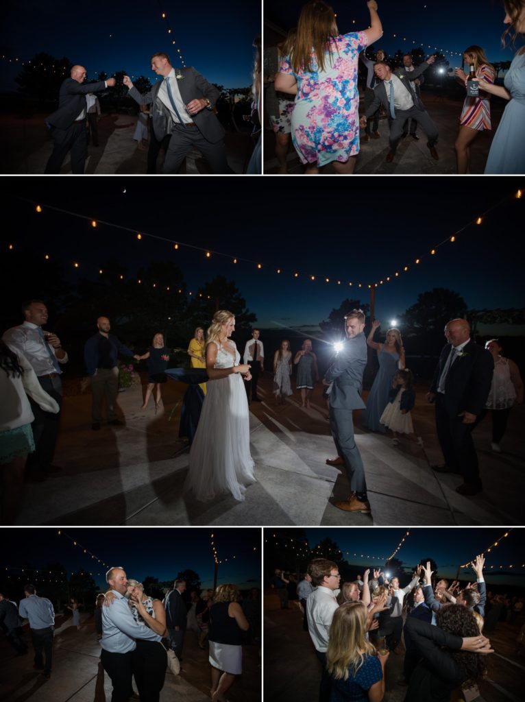 Colorado wedding guests party on the patio at night